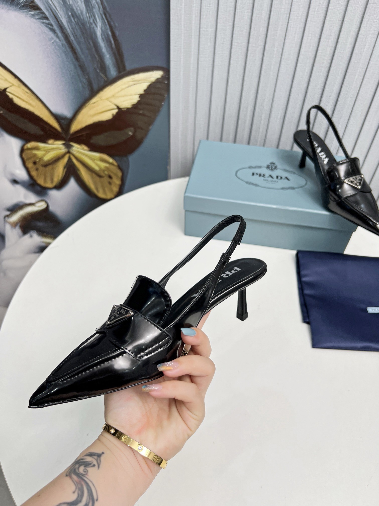 Pra*a slingback pumps 45mm in black patent calfskin