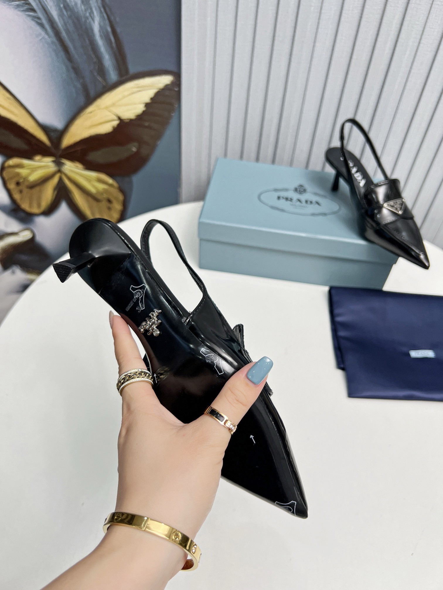 Pra*a slingback pumps 45mm in black patent calfskin