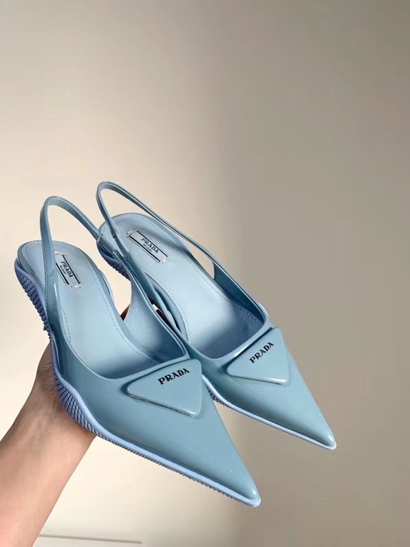 Pra*a slingback pumps in light blue brushed leather