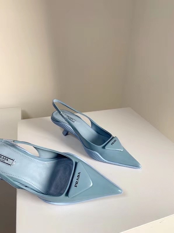 Pra*a slingback pumps in light blue brushed leather