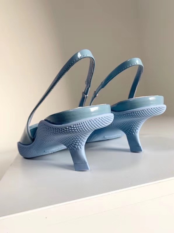 Pra*a slingback pumps in light blue brushed leather