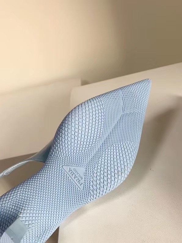 Pra*a slingback pumps in light blue brushed leather