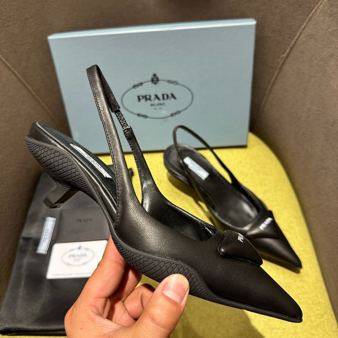 Pra*a slingback pumps in black padded leather