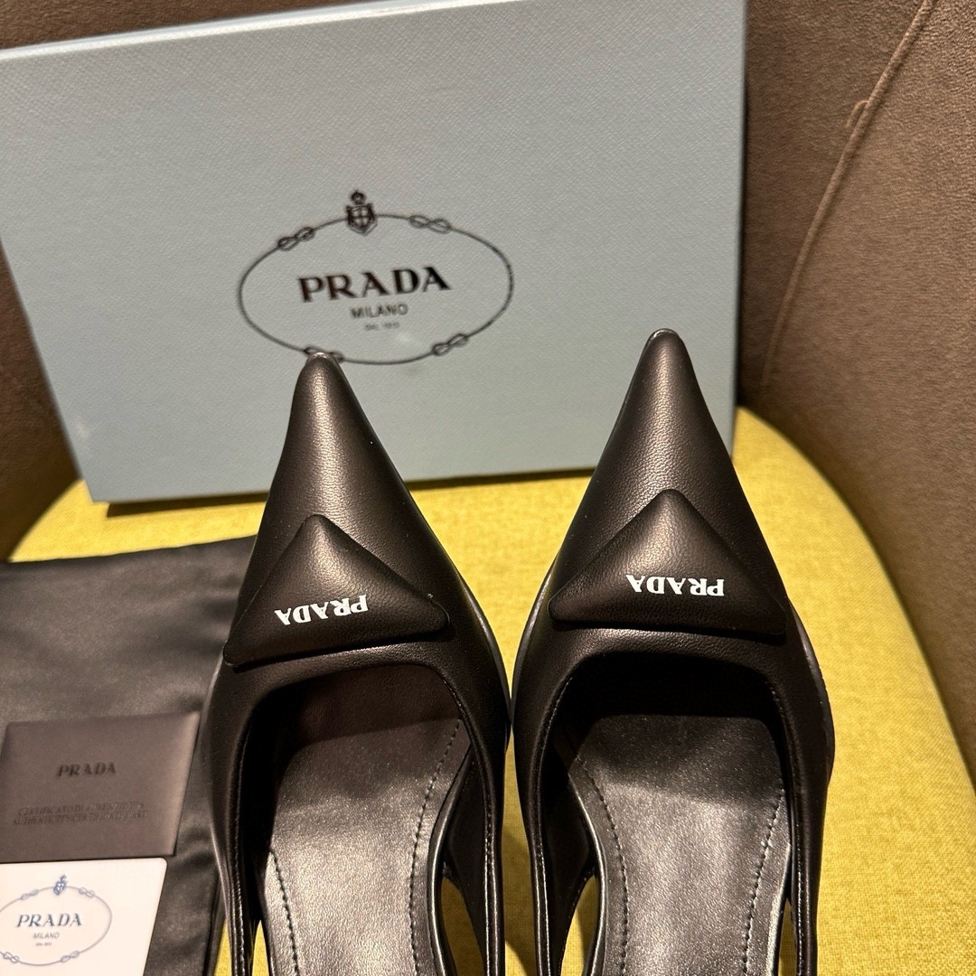Pra*a slingback pumps in black padded leather