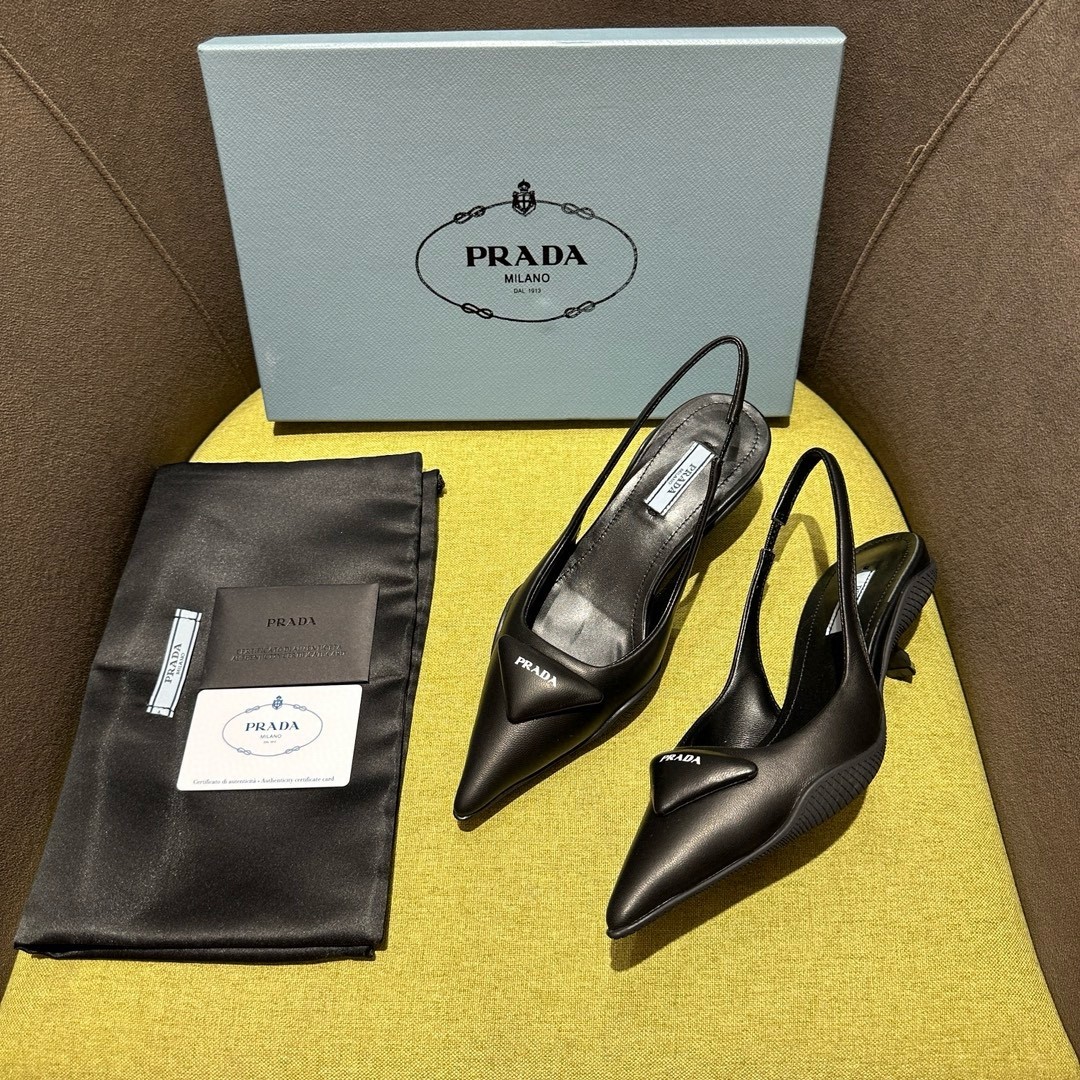 Pra*a slingback pumps in black padded leather