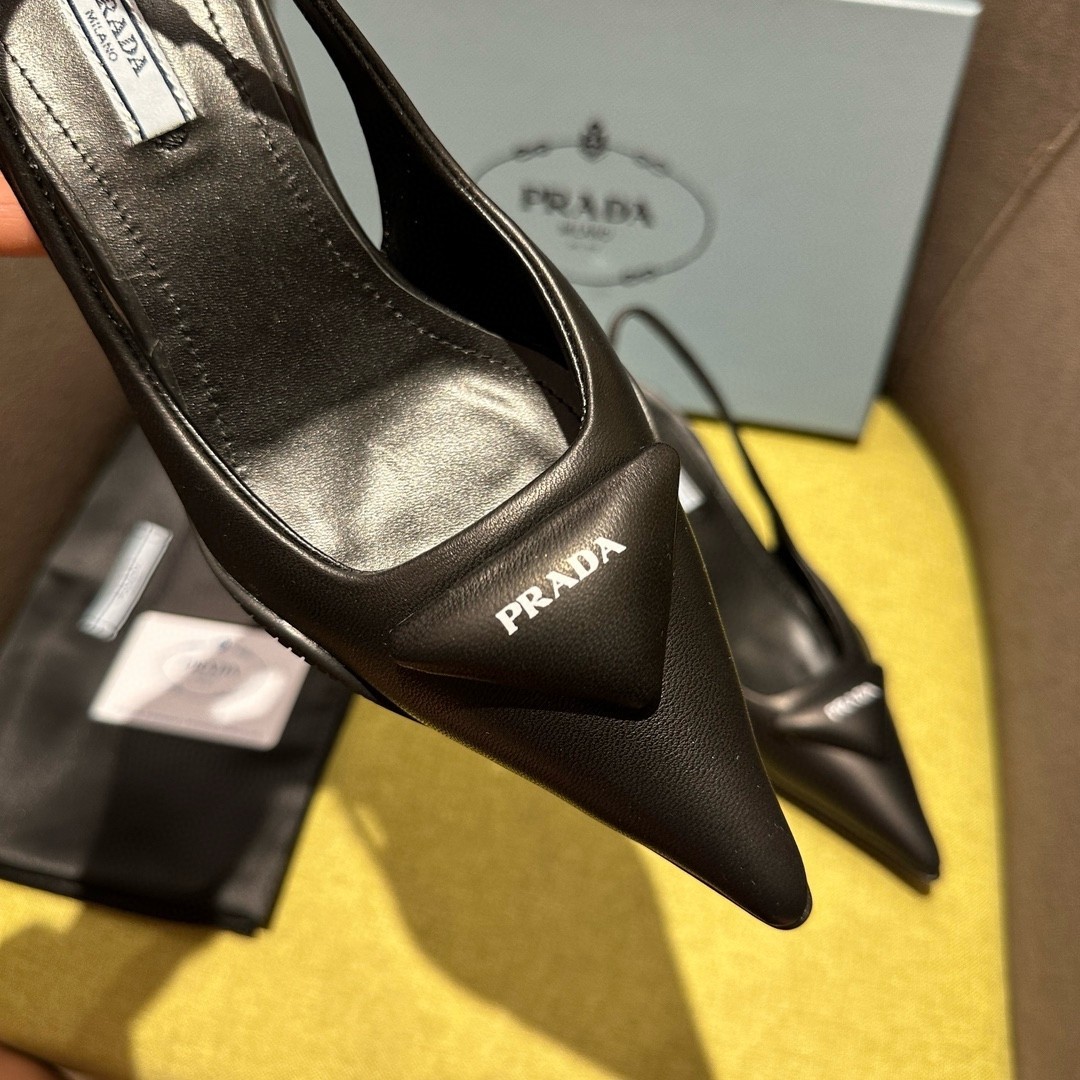 Pra*a slingback pumps in black padded leather