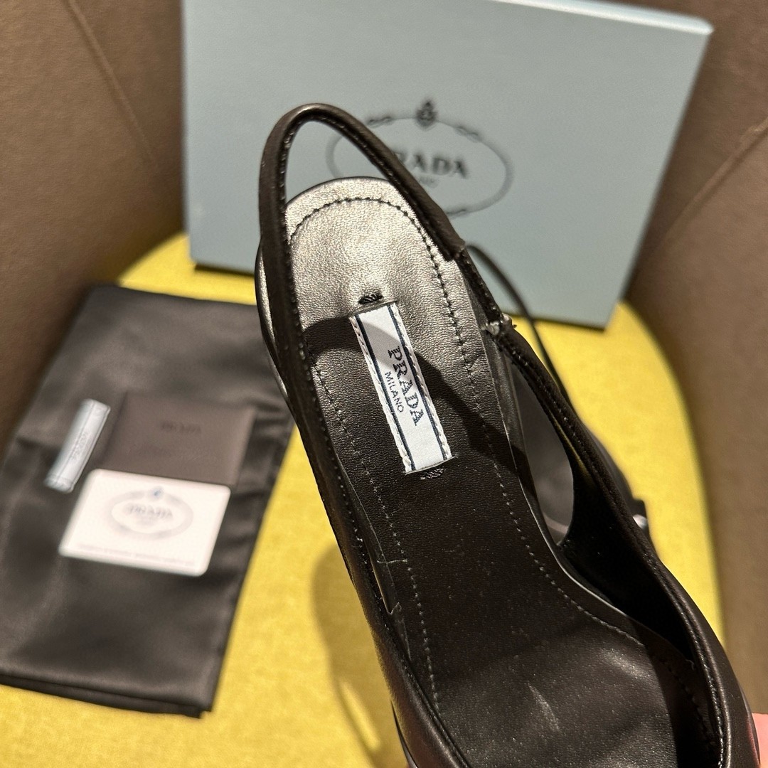 Pra*a slingback pumps in black padded leather