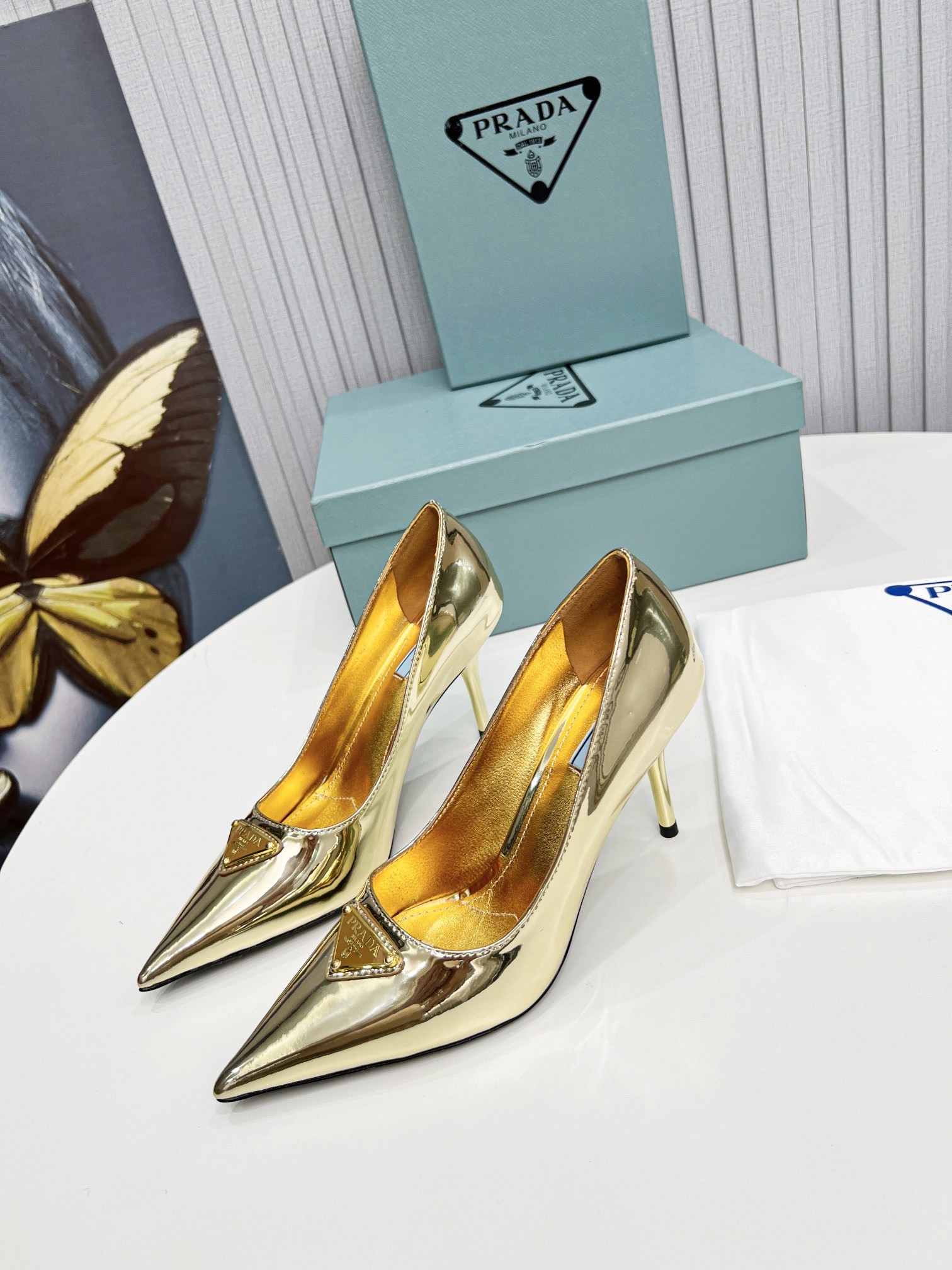 Pra*a pumps 85mm in gold metallic leather