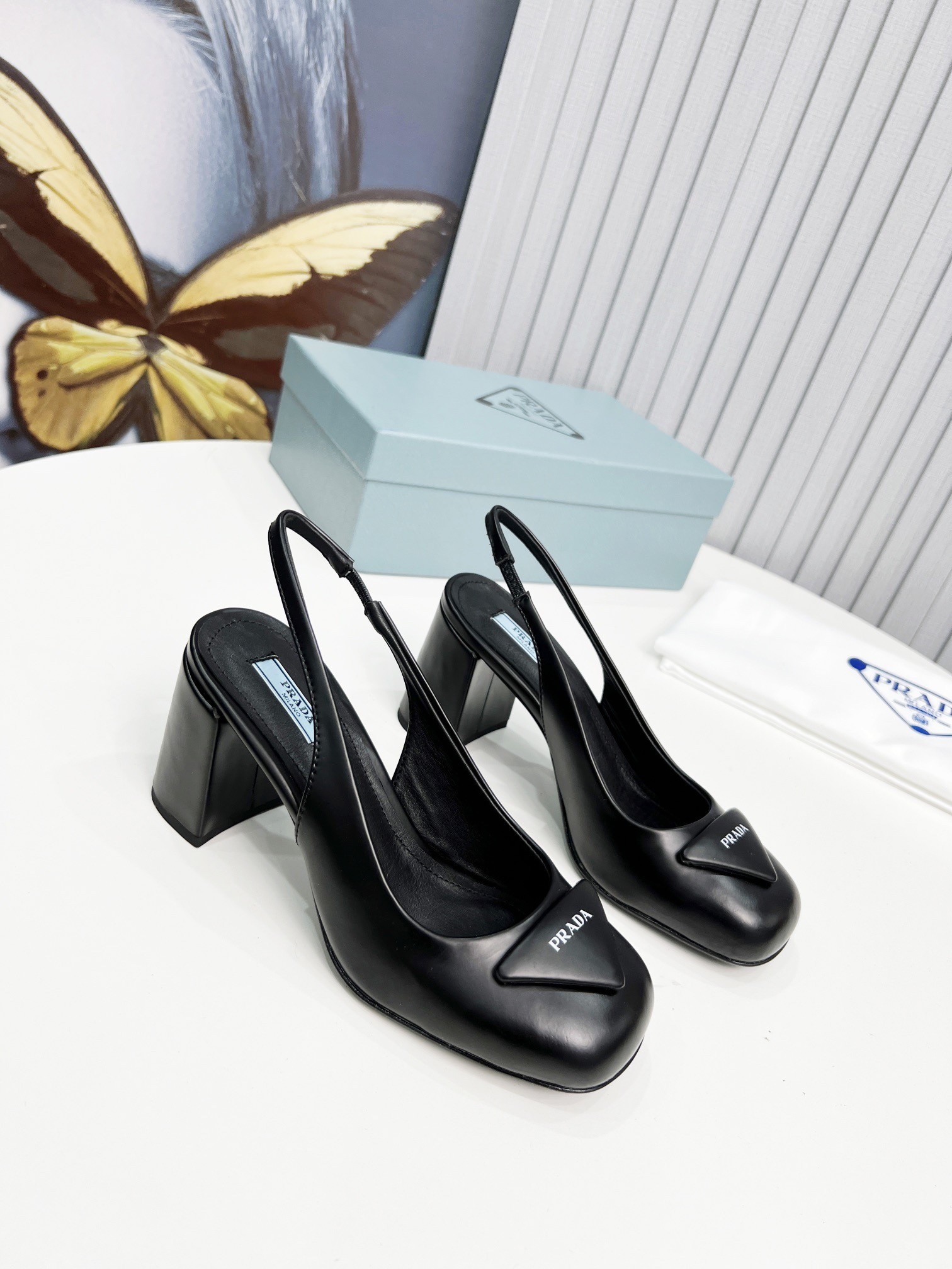 Pra*a slingbacks pumps 75mm in black patent leather