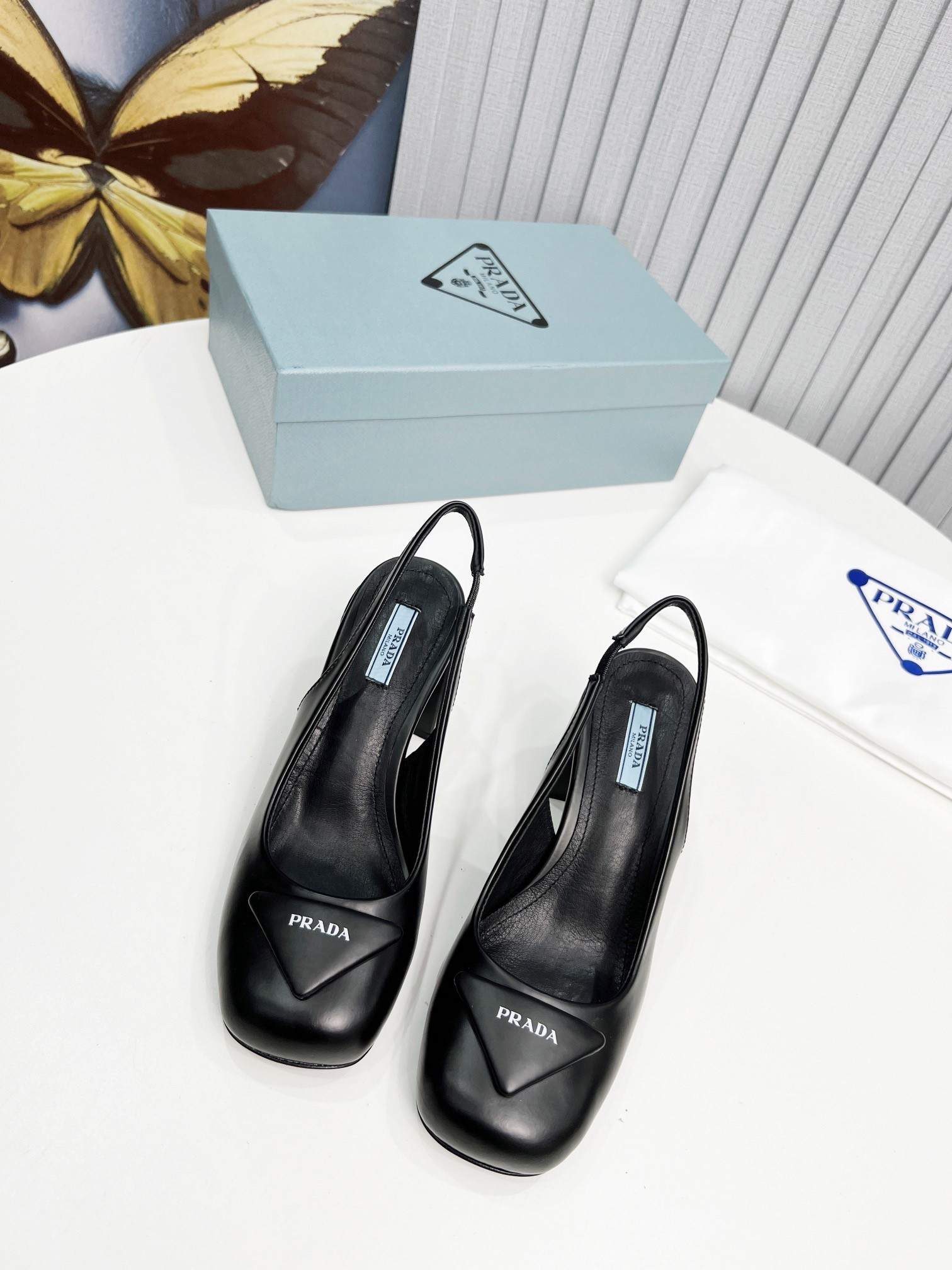 Pra*a slingbacks pumps 75mm in black patent leather