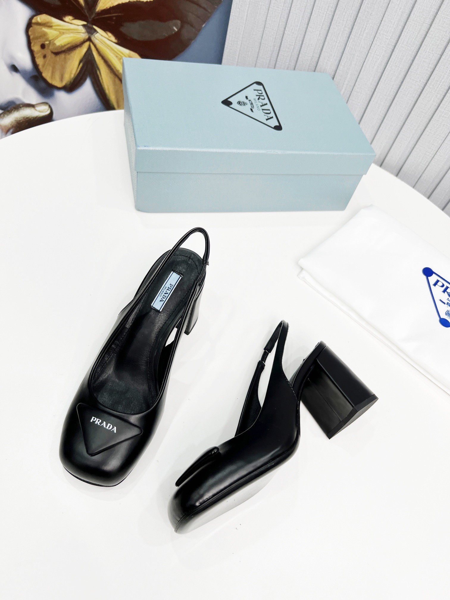 Pra*a slingbacks pumps 75mm in black patent leather