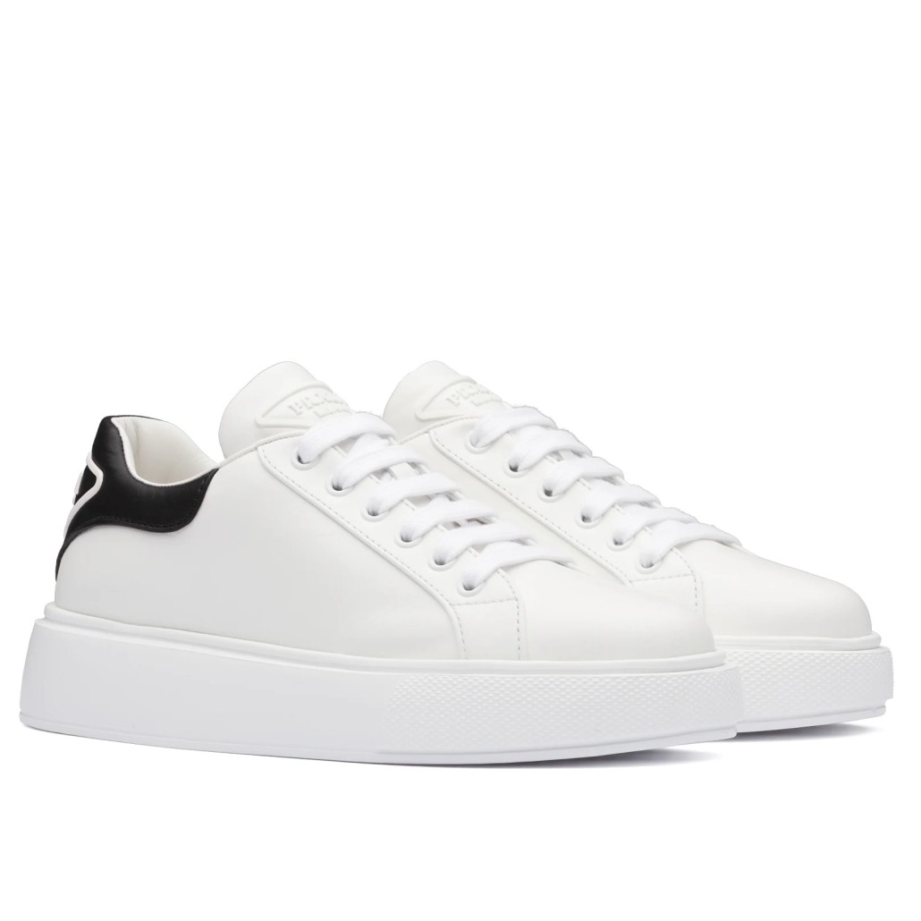 Pra*a women''s sneakers with black triangle logo heel