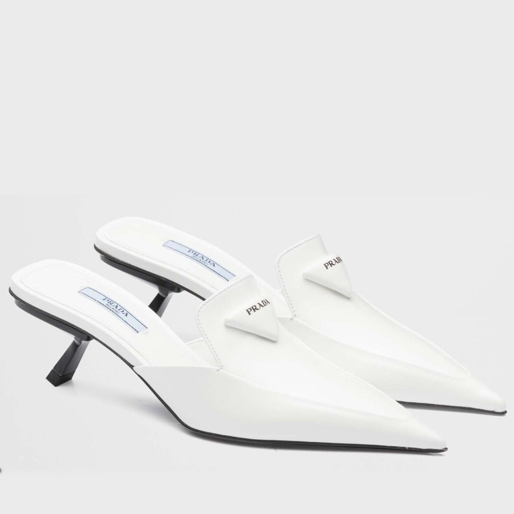 Pra*a sabots mules in white brushed leather