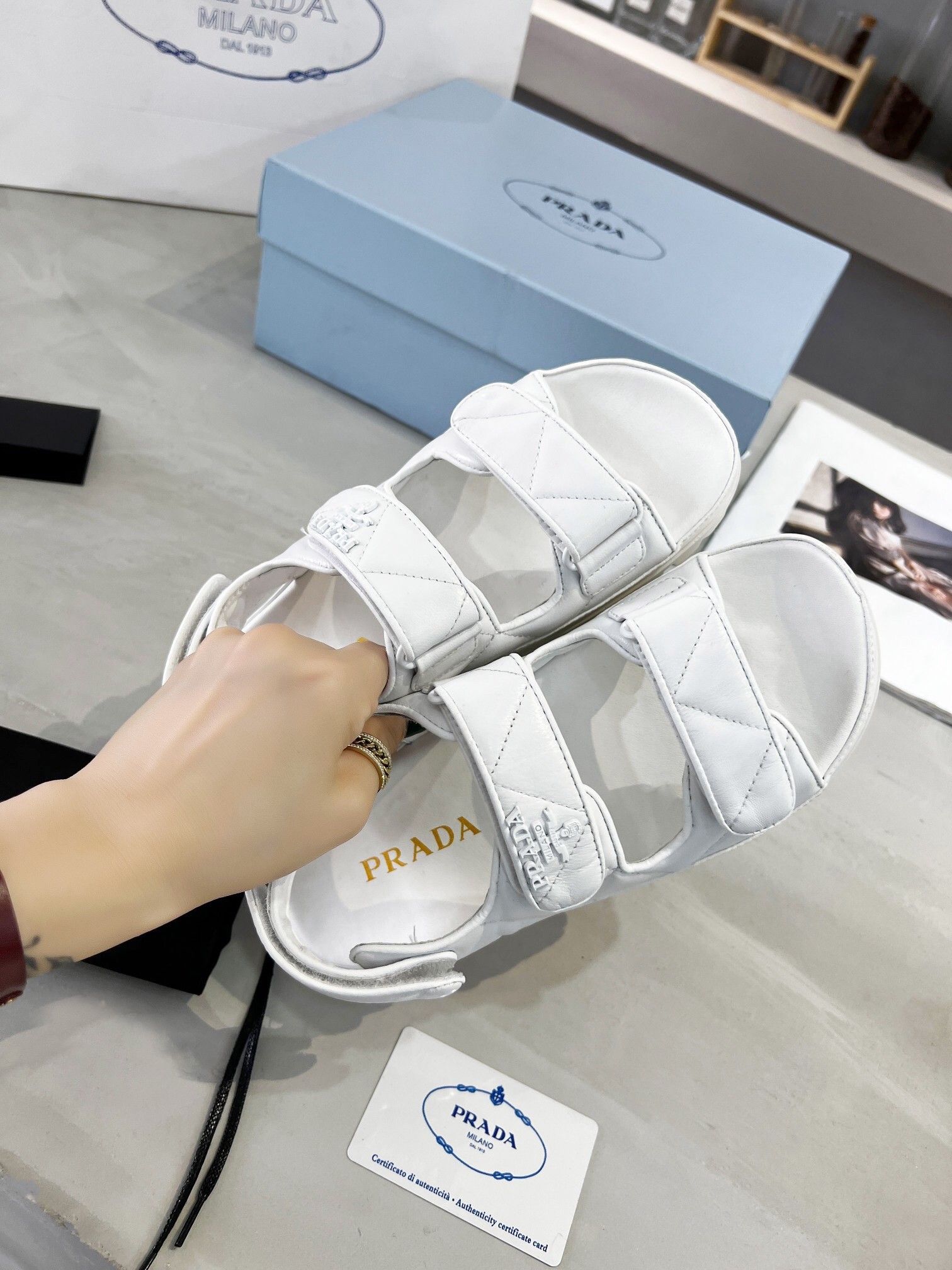 Pra*a padded sandals in white nappa leather
