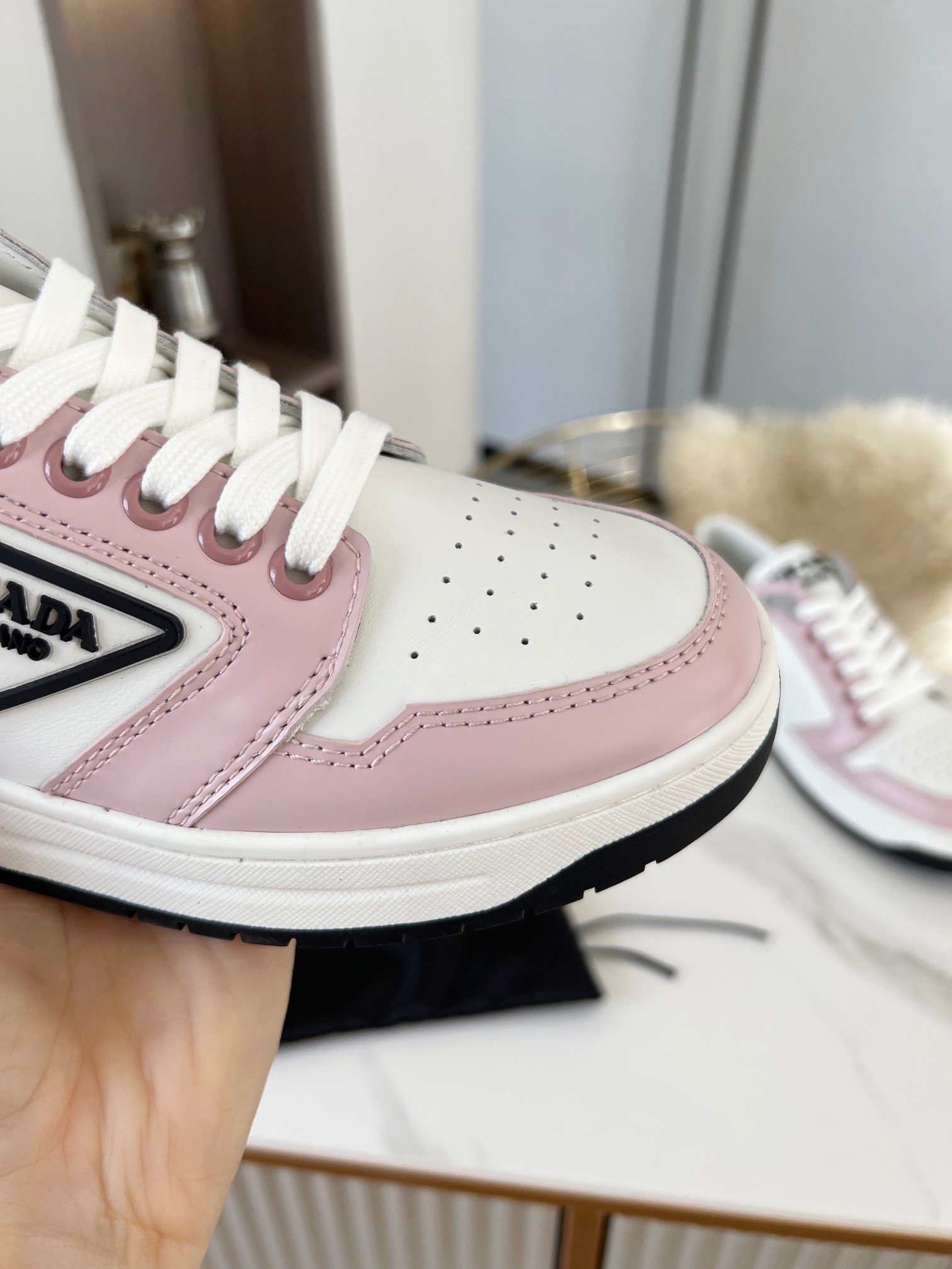 Pra*a district sneakers in white and pink calfskin