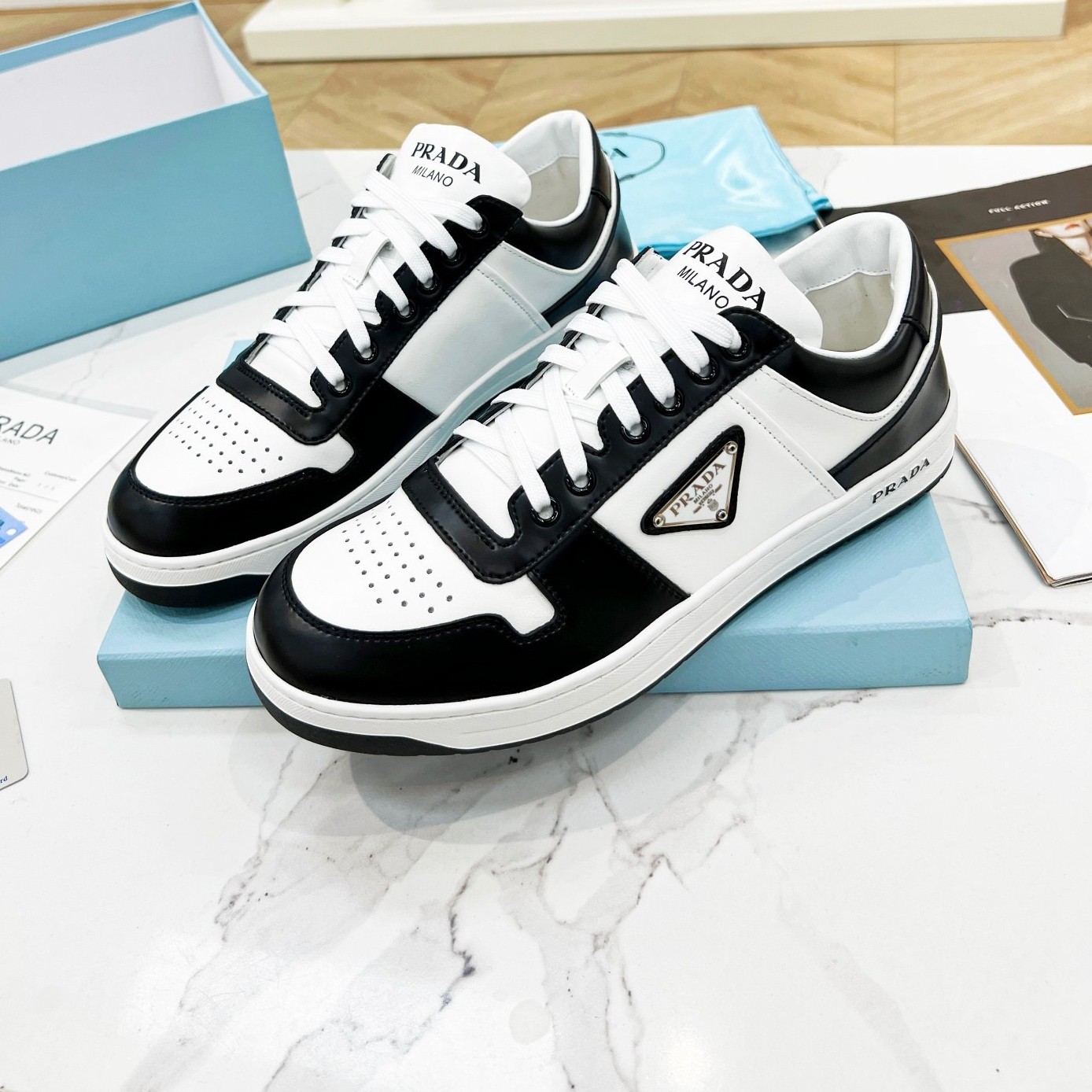 Pra*a downtown sneakers in white and black calfskin