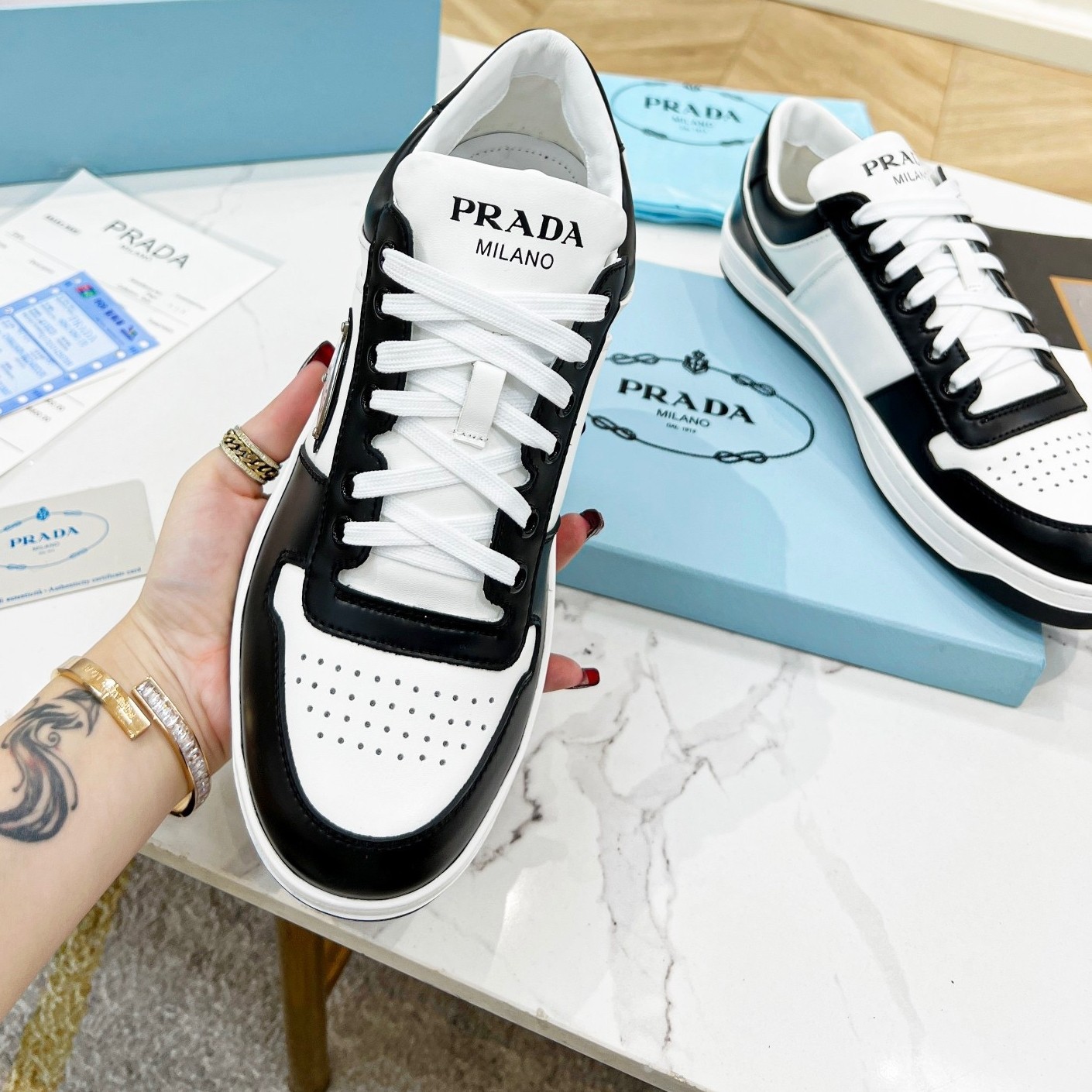 Pra*a downtown sneakers in white and black calfskin