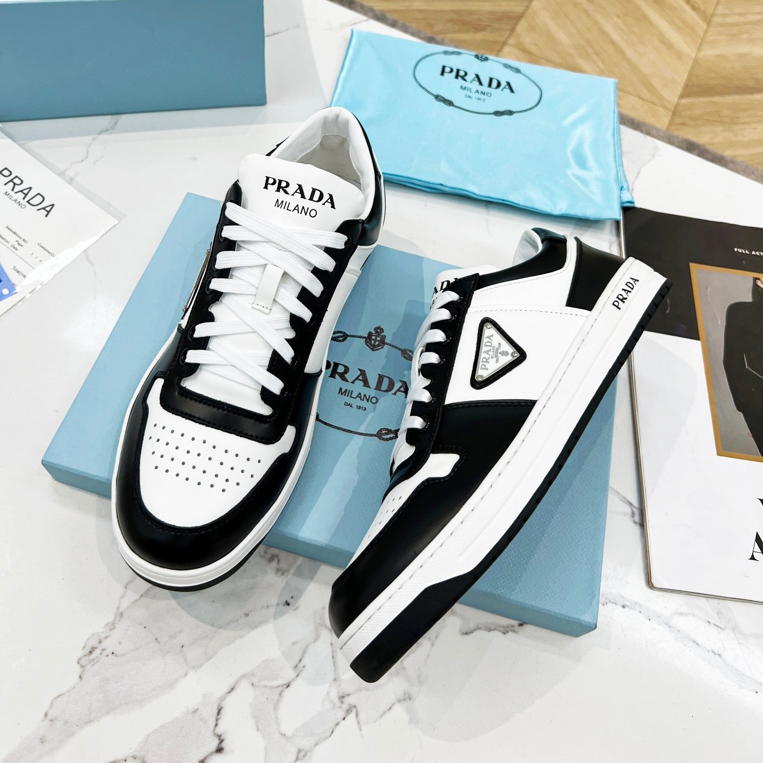 Pra*a downtown sneakers in white and black calfskin
