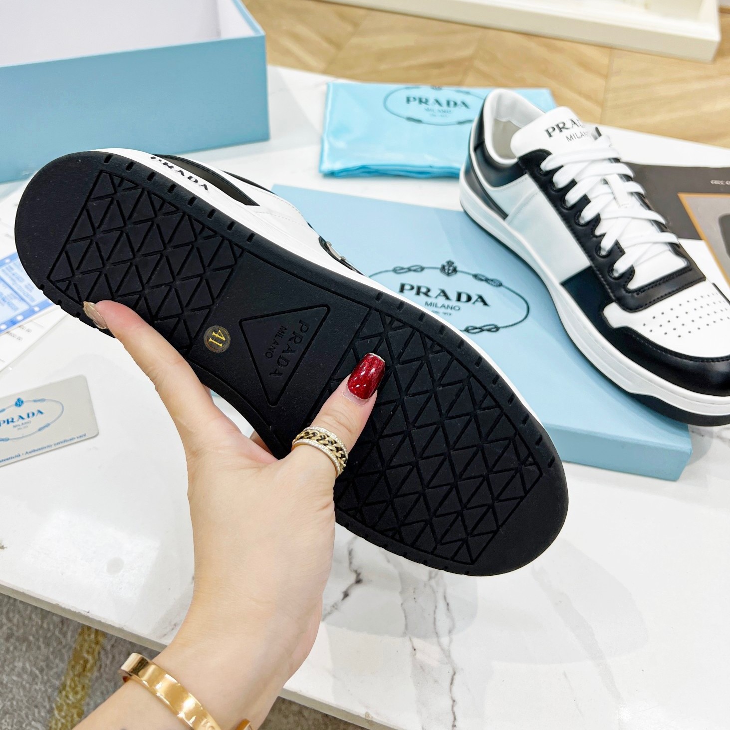 Pra*a downtown sneakers in white and black calfskin