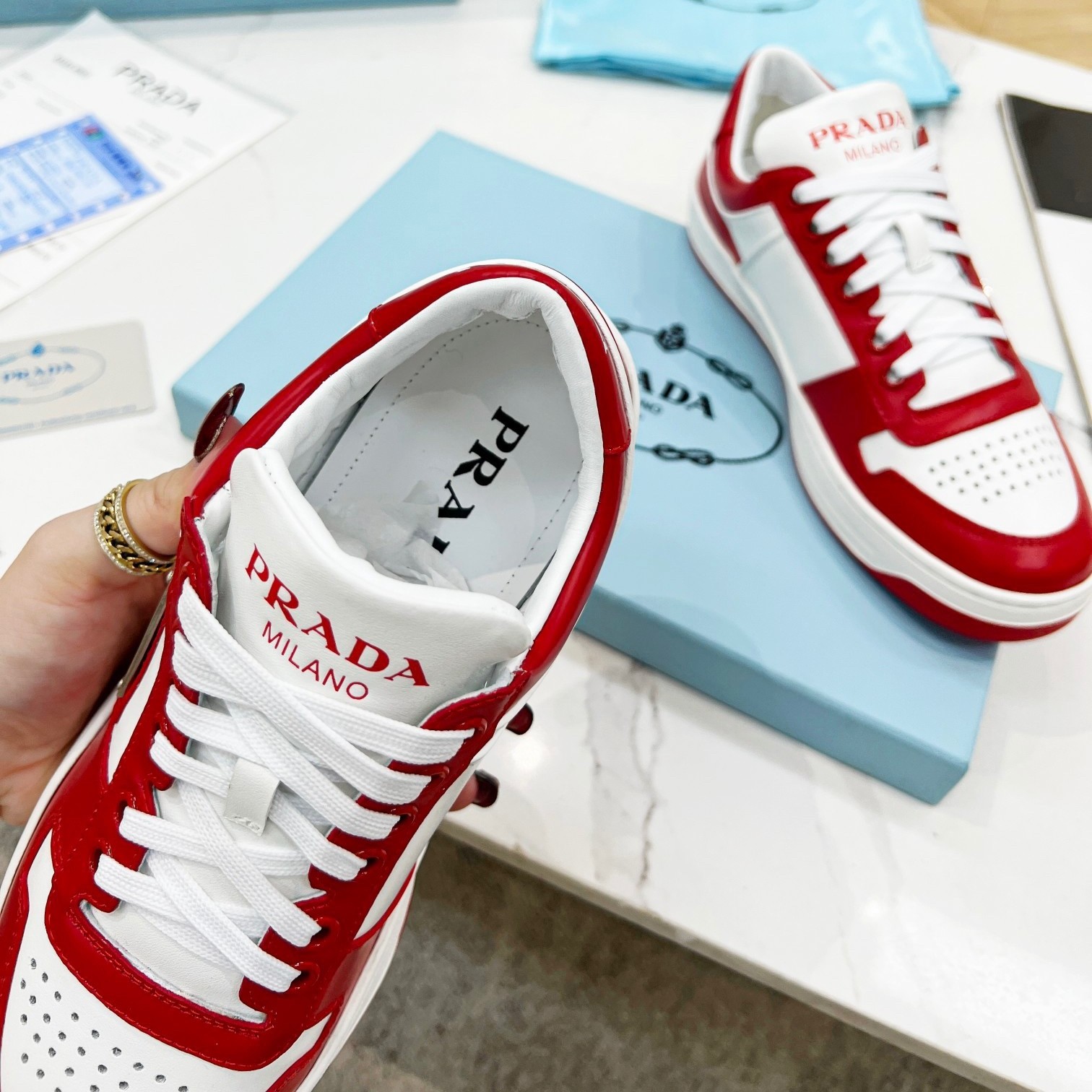 Pra*a downtown sneakers in white and red calfskin