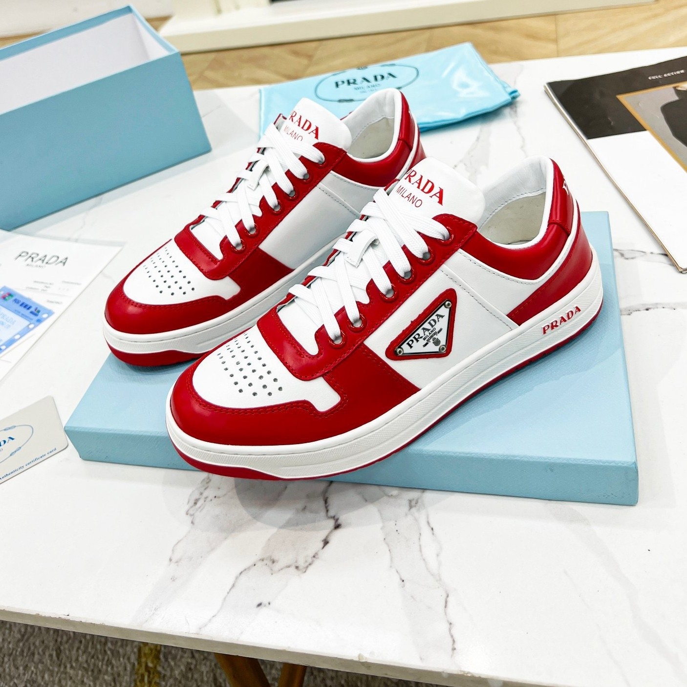 Pra*a downtown sneakers in white and red calfskin