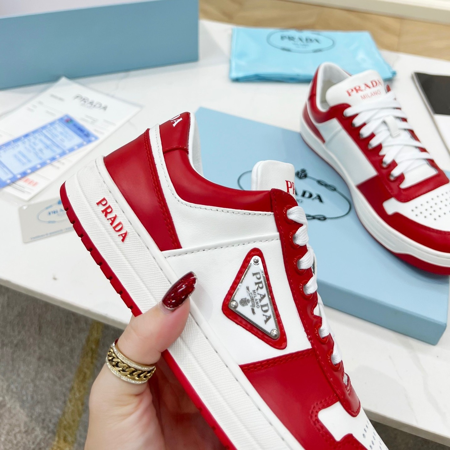 Pra*a downtown sneakers in white and red calfskin