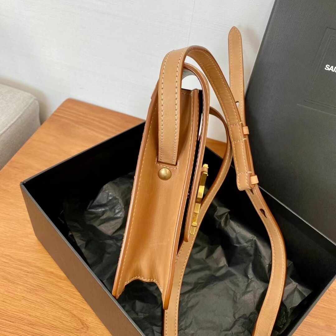 Sa**t Lau*nt kaia n0*h south bag in brown leather