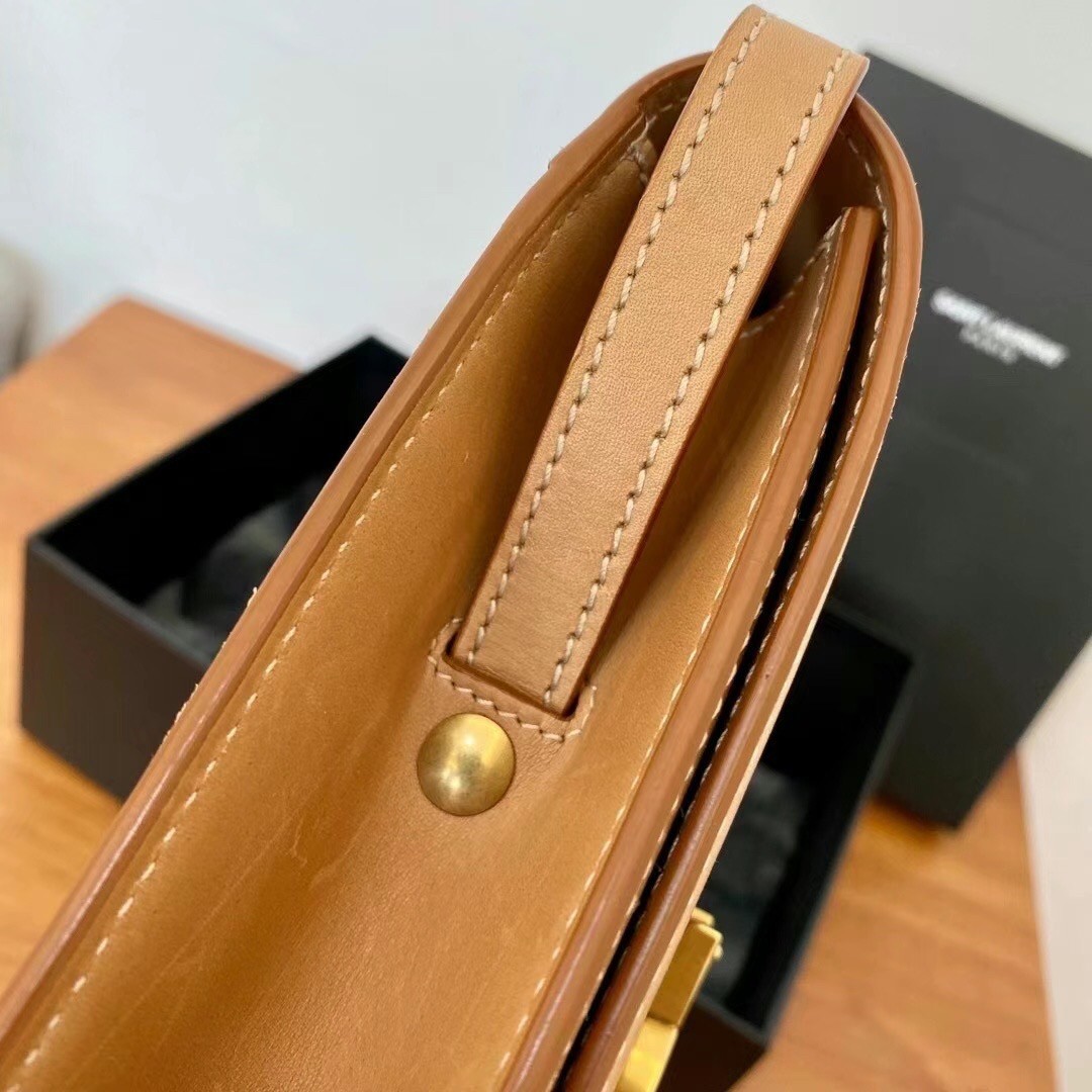 Sa**t Lau*nt kaia n0*h south bag in brown leather