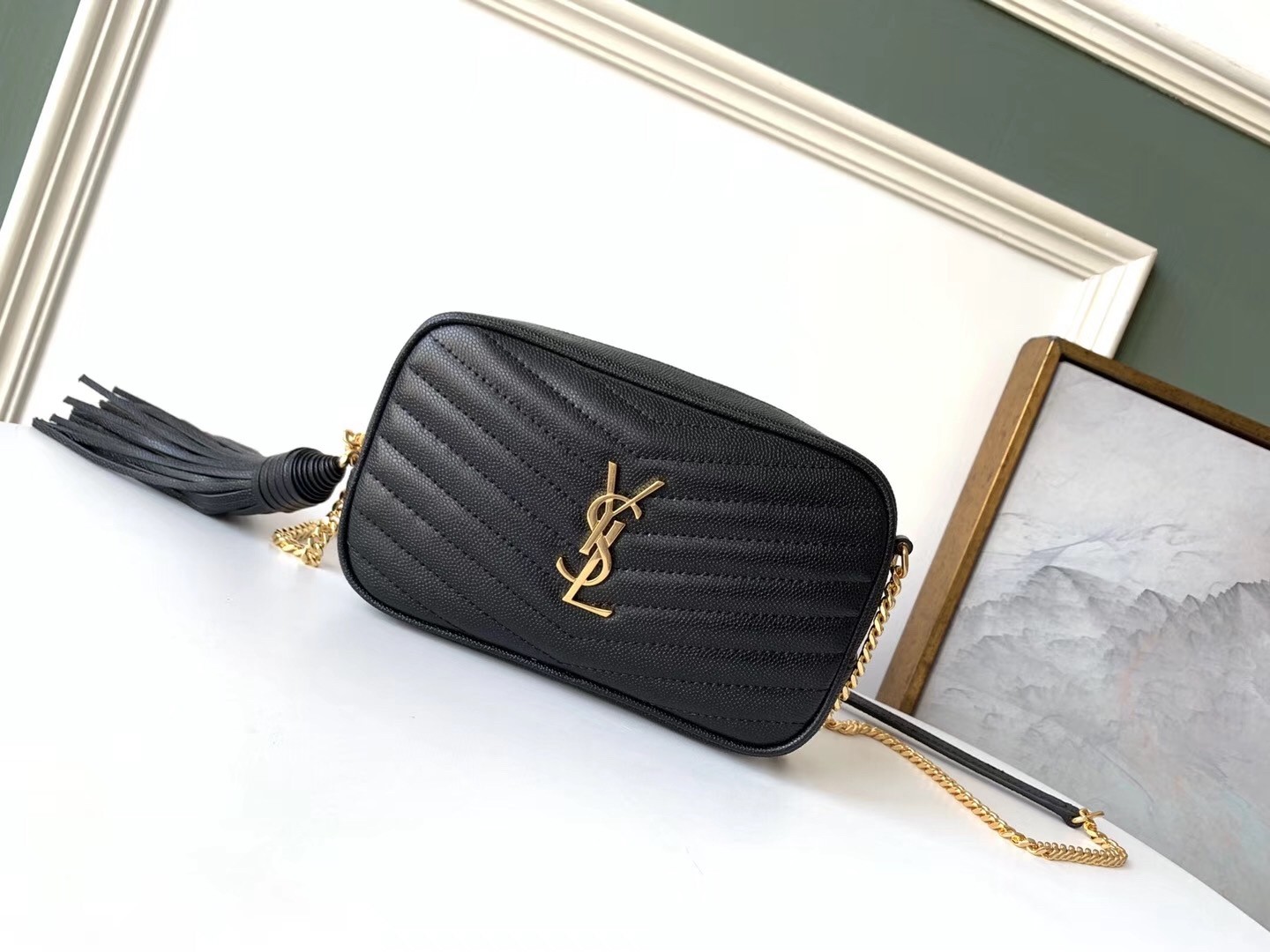 Sa**t Lau*nt lou mini bag in black grained leather