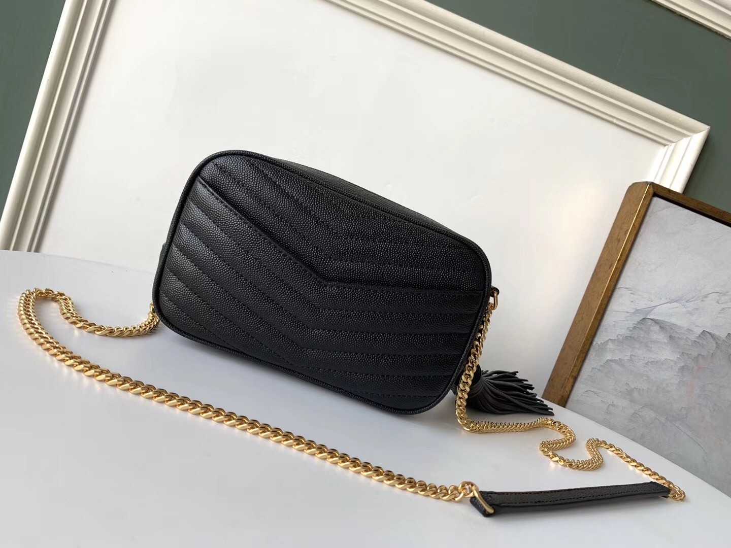 Sa**t Lau*nt lou mini bag in black grained leather
