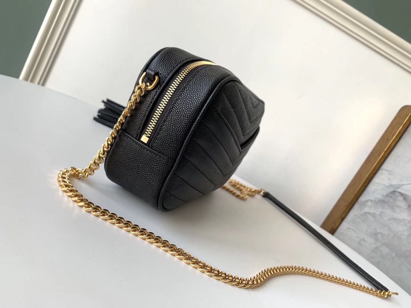 Sa**t Lau*nt lou mini bag in black grained leather
