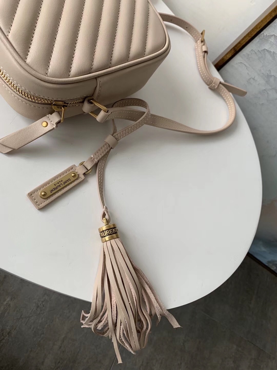 Sa**t Lau*nt lou camera bag in light pink leather