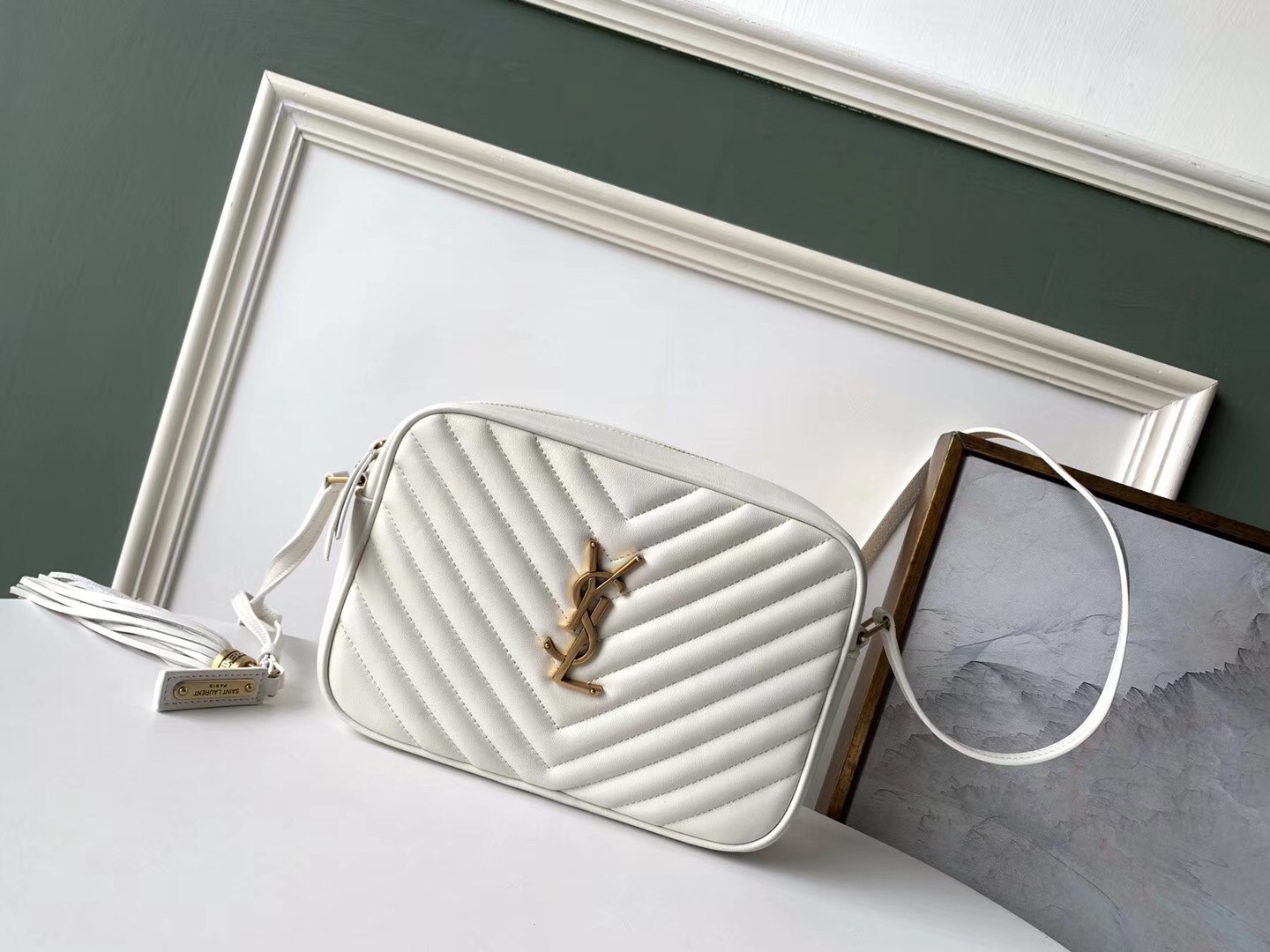Sa**t Lau*nt lou camera bag in white leather