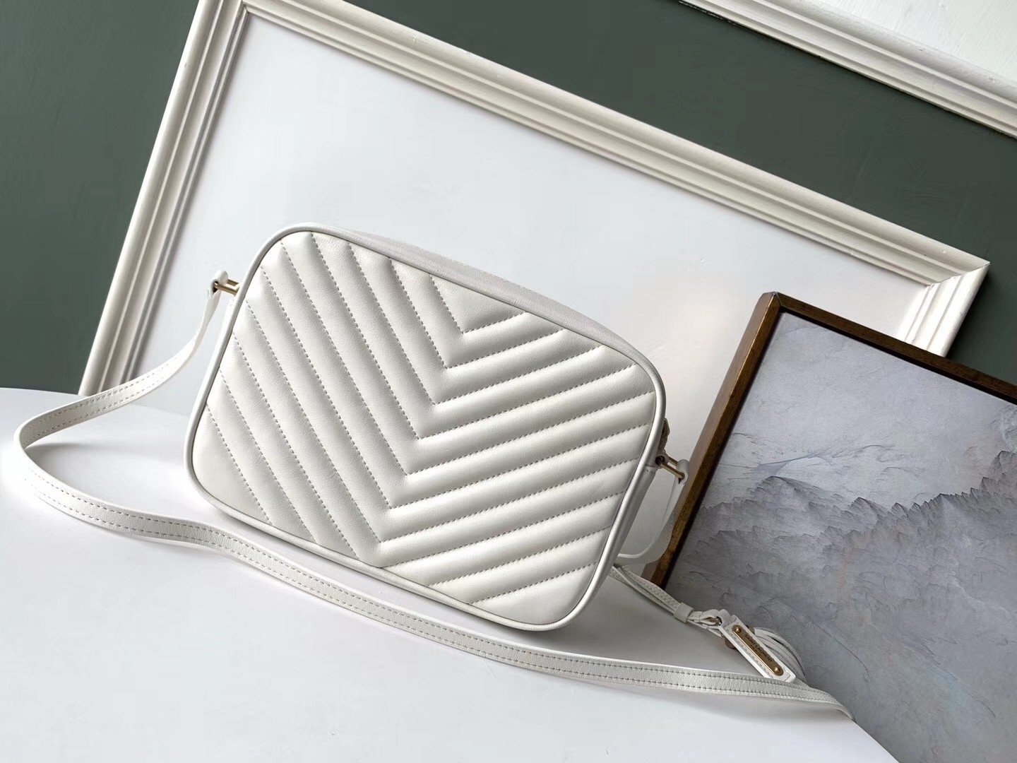Sa**t Lau*nt lou camera bag in white leather