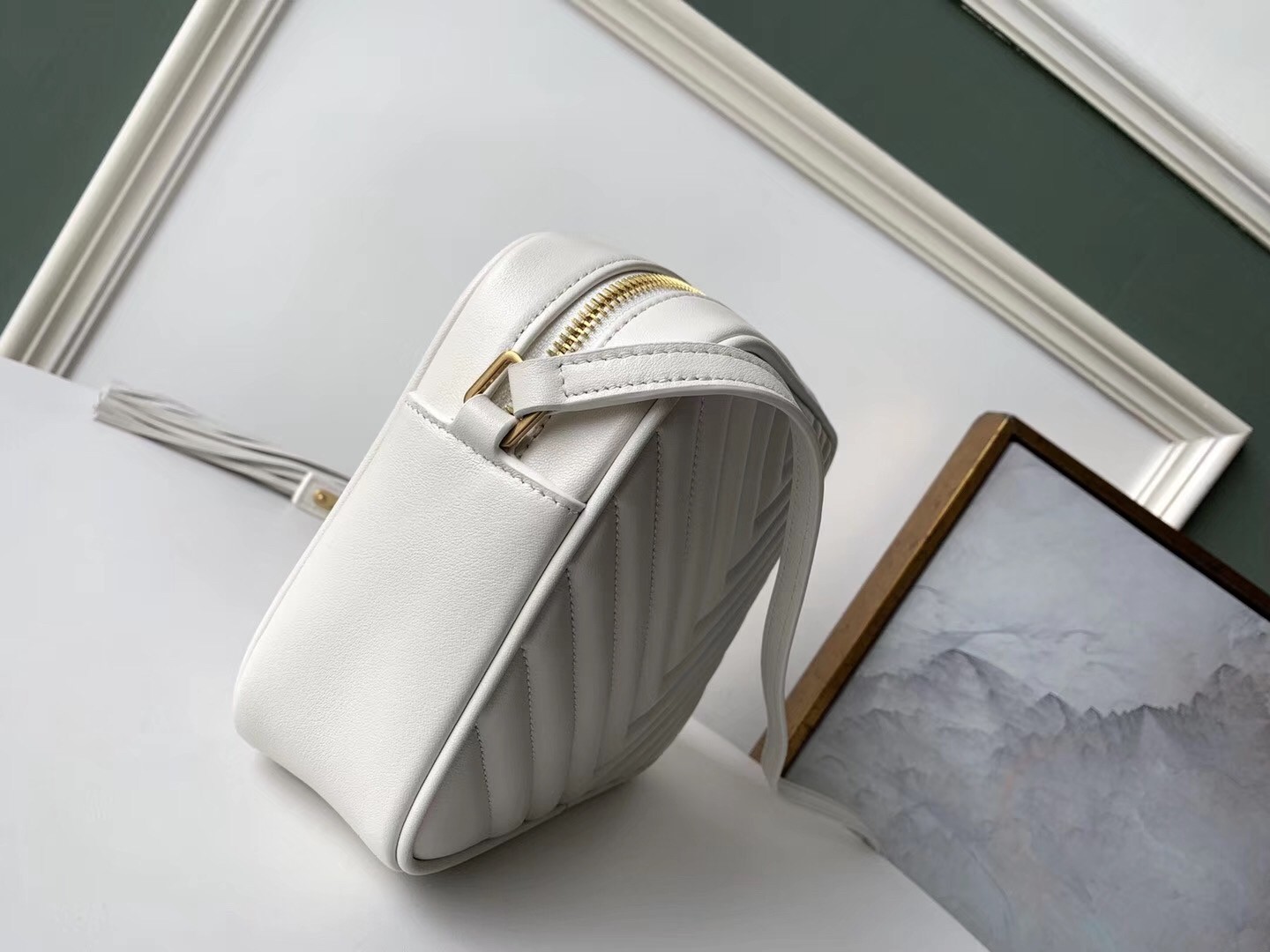 Sa**t Lau*nt lou camera bag in white leather