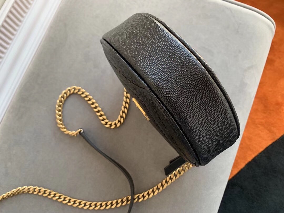 Sa**t Lau*nt vinyle round camera bag in black grained leather