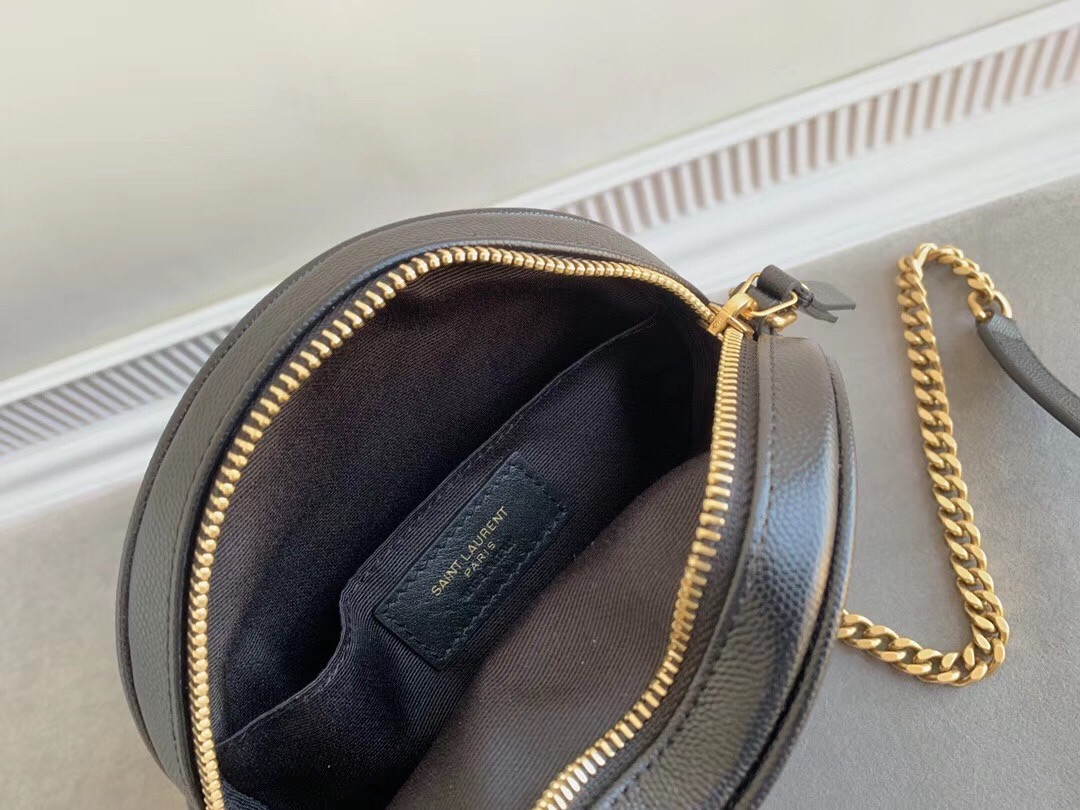 Sa**t Lau*nt vinyle round camera bag in black grained leather