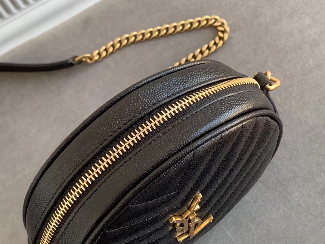 Sa**t Lau*nt vinyle round camera bag in black grained leather