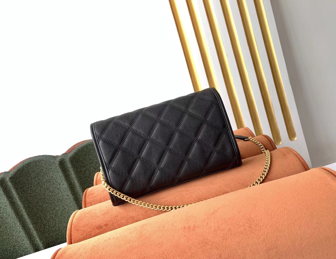 Sa**t Lau*nt woc becky chain wallet in black lambskin