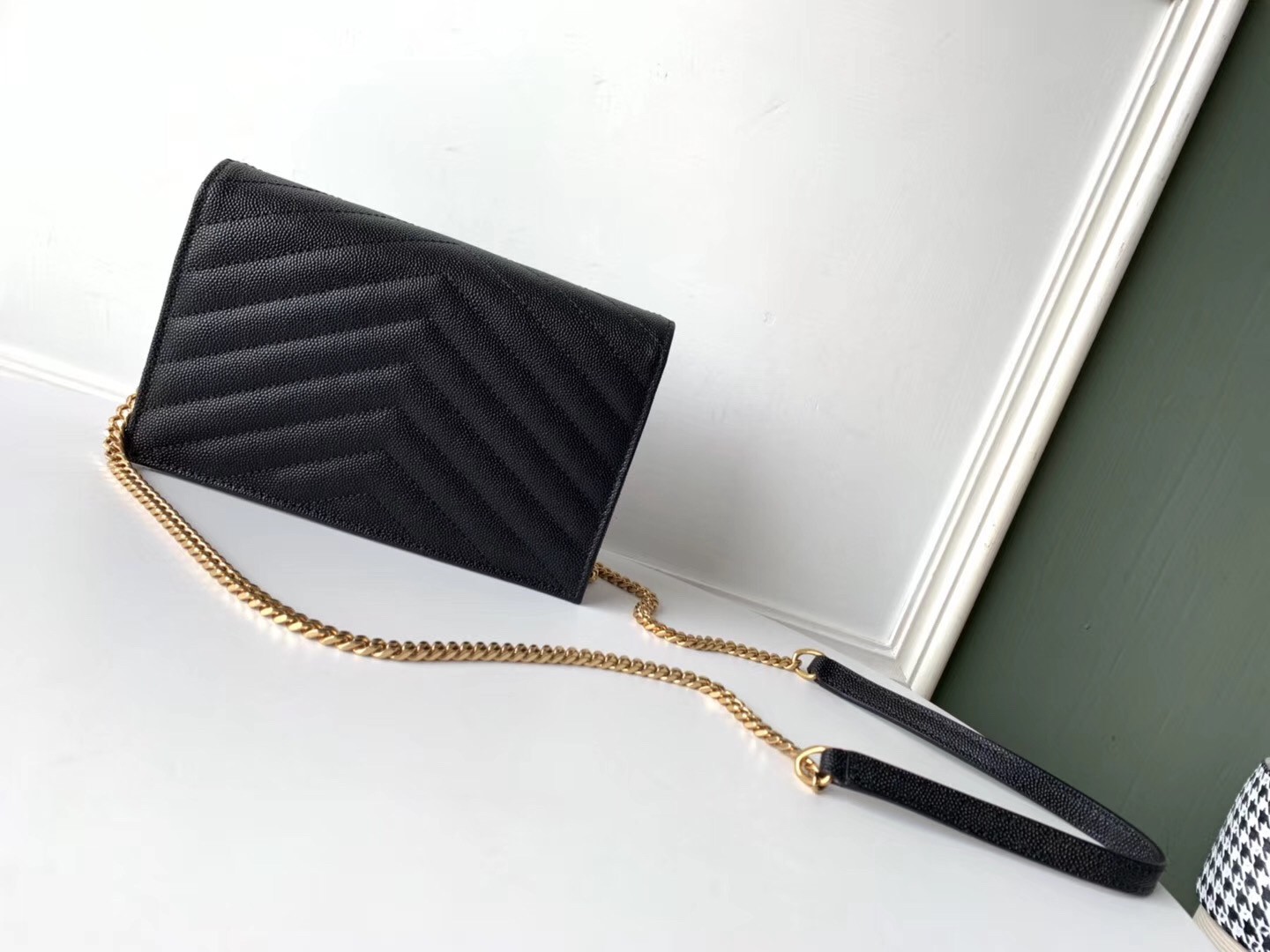 Sa**t Lau*nt woc envelope chain wallet in black leather