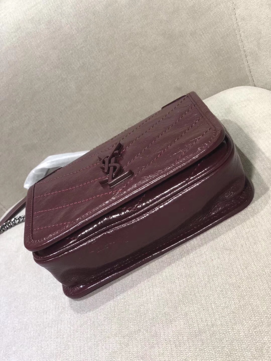 Sa**t Lau*nt woc niki chain wallet in bordeaux crinkled leather
