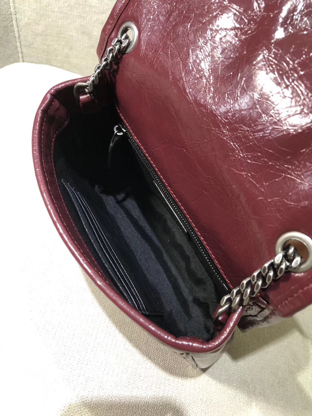 Sa**t Lau*nt woc niki chain wallet in bordeaux crinkled leather
