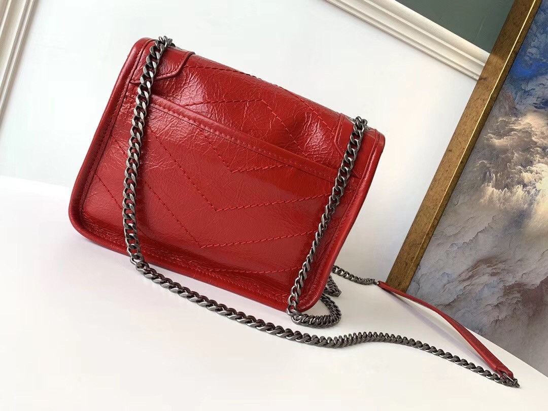Sa**t Lau*nt woc niki chain wallet in red crinkled leather
