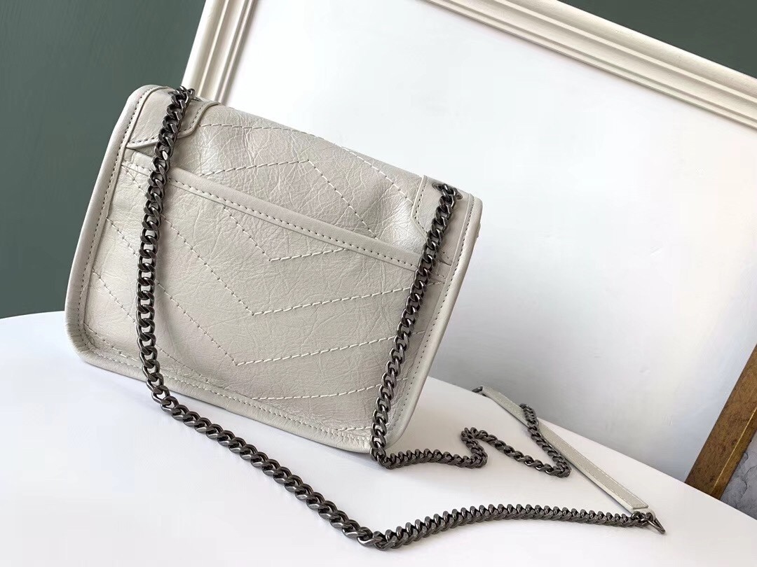 Sa**t Lau*nt woc niki chain wallet in white crinkled leather