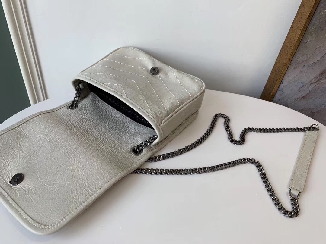 Sa**t Lau*nt woc niki chain wallet in white crinkled leather