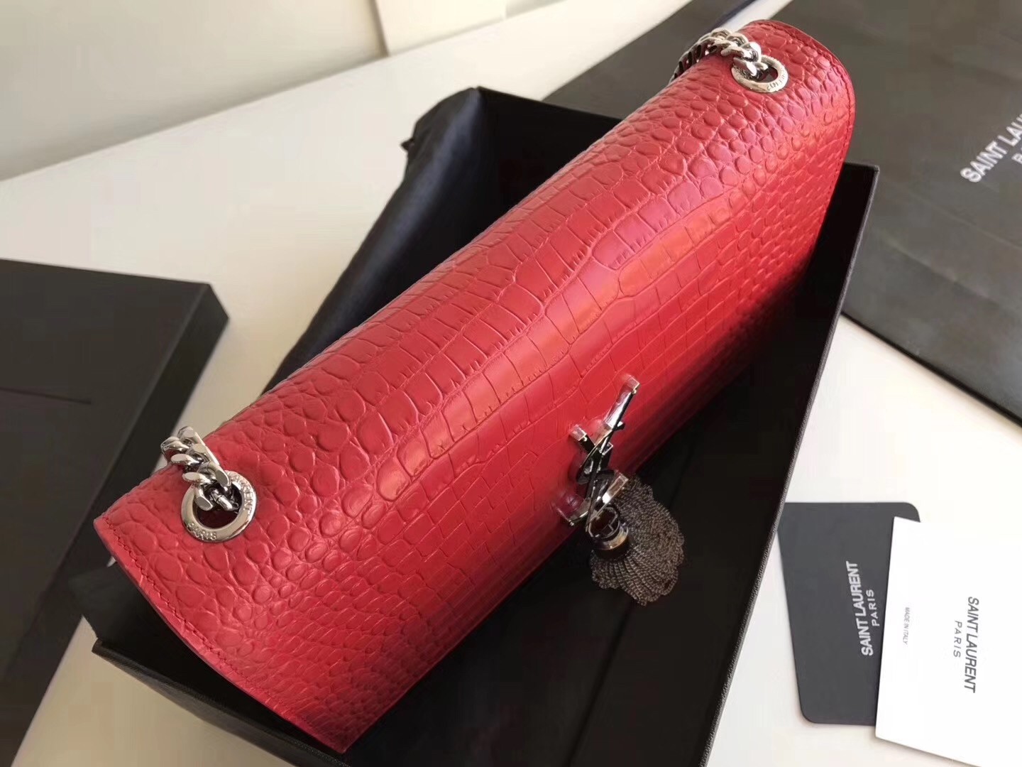 Sa**t Lau*nt medium kate bag with tassel in red croc-embossed leather