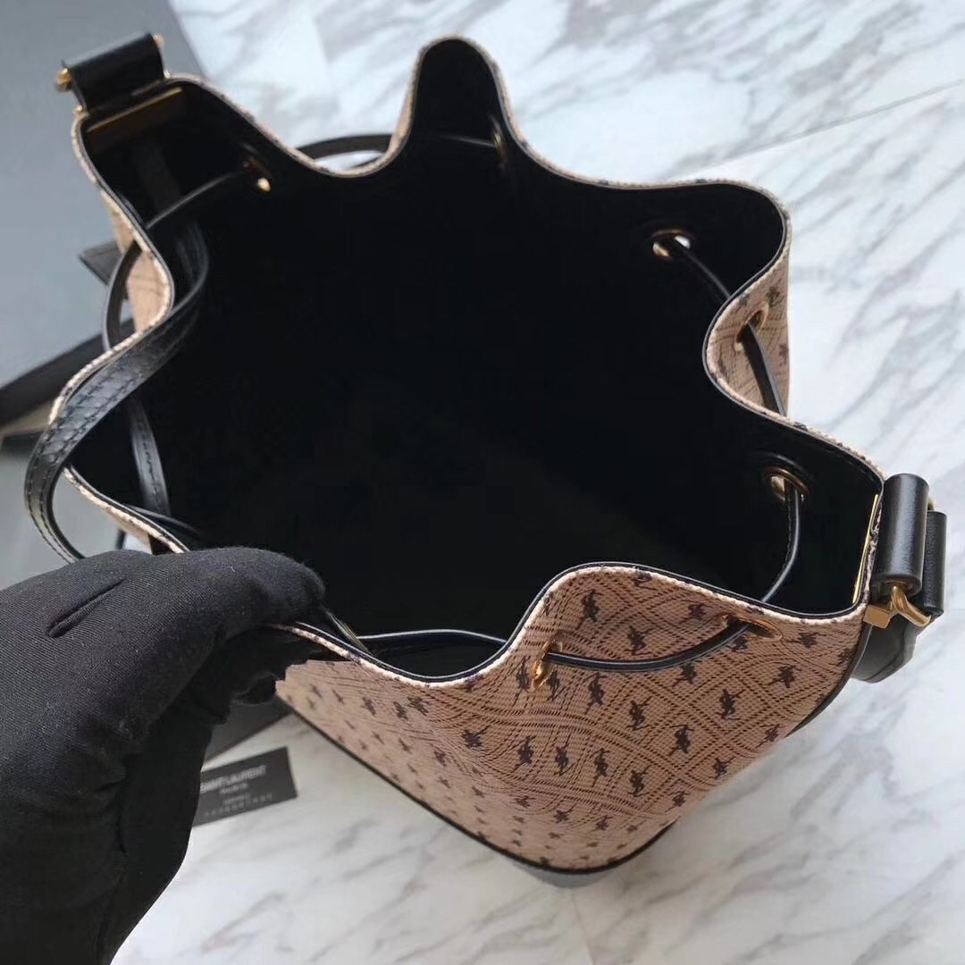 Sa**t Lau*nt monogram all over bucket bag in canvas