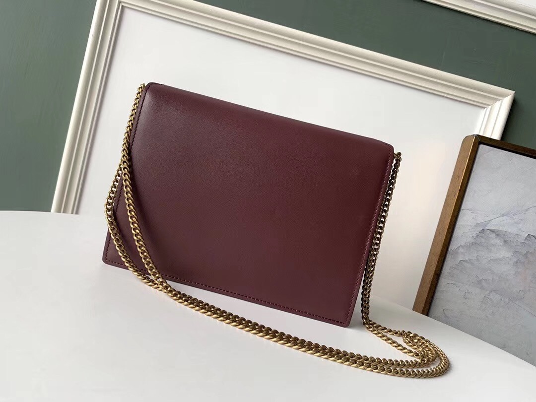 Sa**t Lau*nt bordeaux cassandra monogram clasp bag
