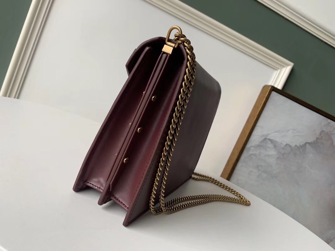 Sa**t Lau*nt bordeaux cassandra monogram clasp bag