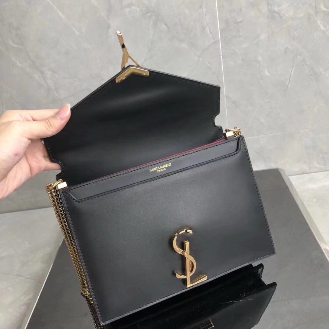 Sa**t Lau*nt black cassandra monogram clasp bag